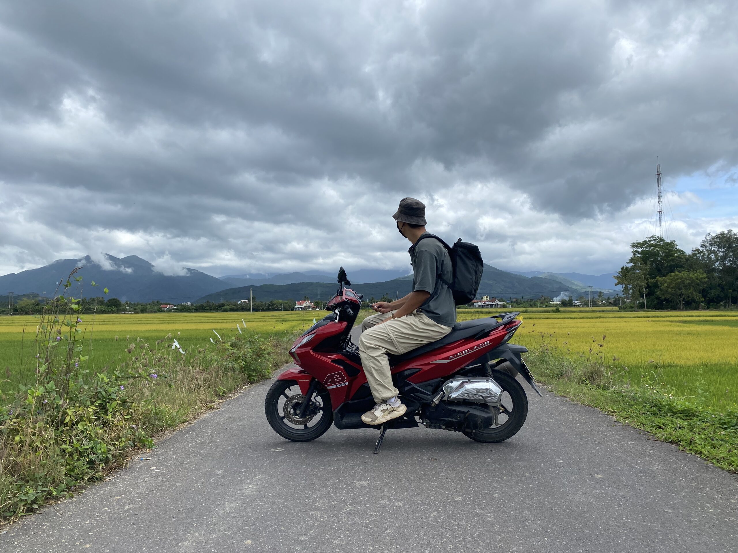 Riding a motorcycle through the rice fields of Vietnam near Nha Trang