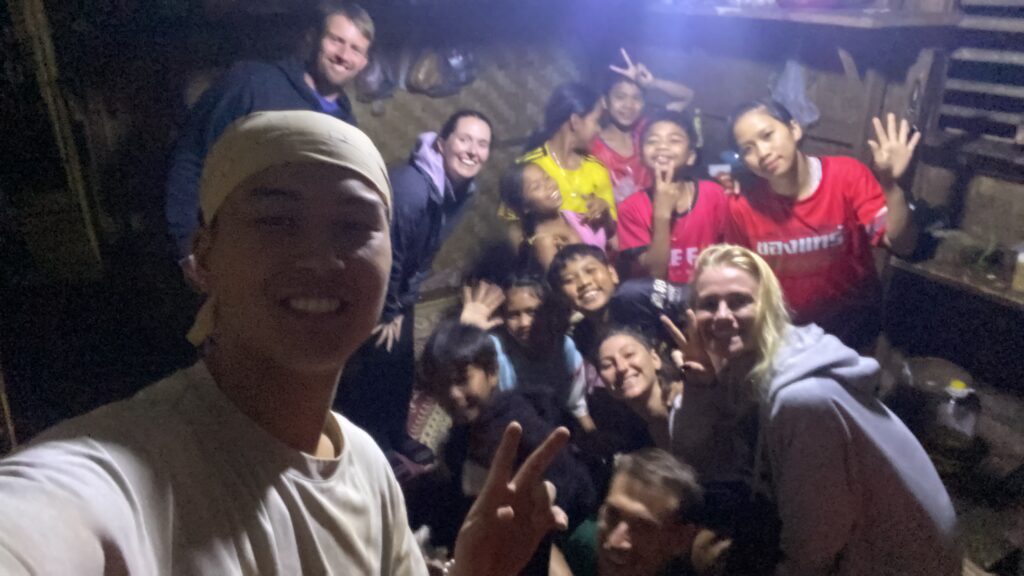 Dinner party at Captain Hook Homestay on the Pakse Loop, Laos