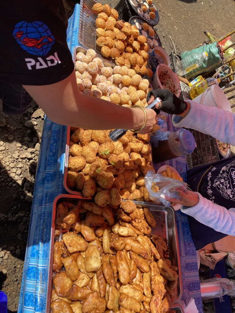 Sweat treats at Paksong Market on the Pakse Loop, Laos