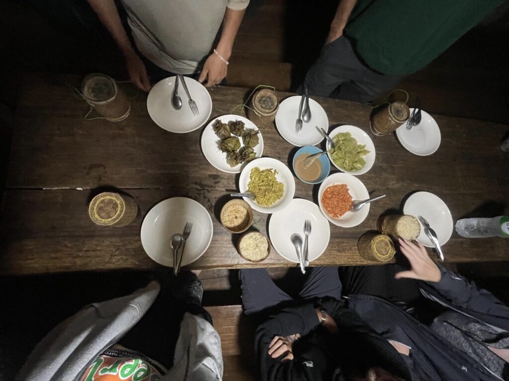 Trying local dishes at Captain Hook Homestay on the Pakse Loop